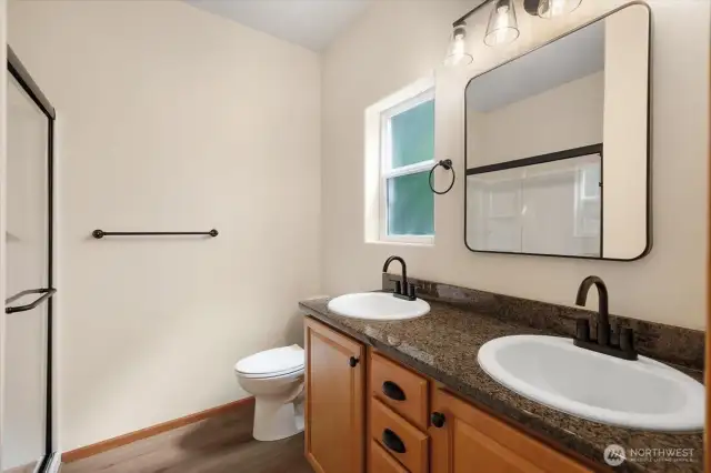 New matte black shower door & bath fixtures.