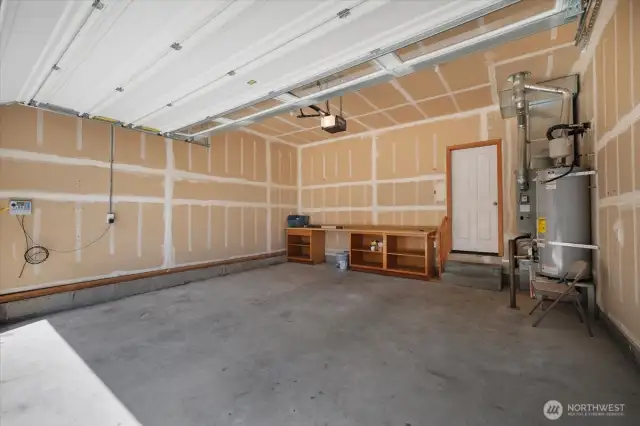2 Car Garage w/ built in storage & work desk. New garage door.