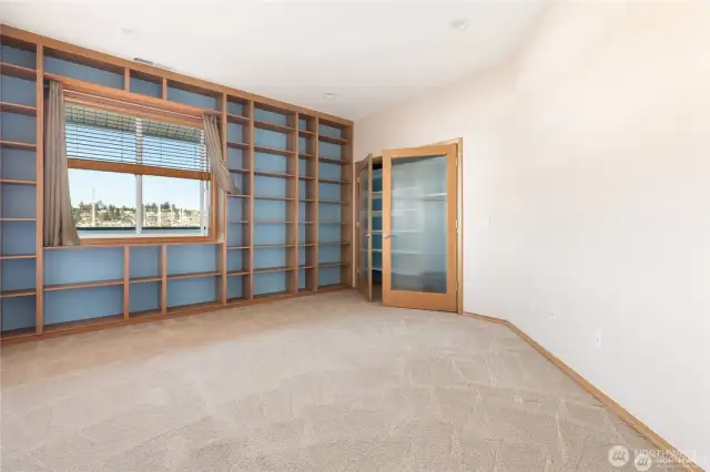2nd bedroom with ample shelving