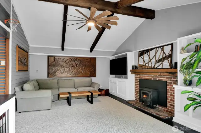 Cozy up by the wood stove or enjoy the breeze from the oversized ceiling fan.