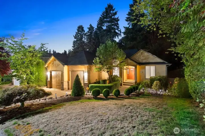 Canyon Ridge Resale! mature landscape with garden lighting.