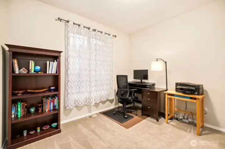 Main floor additional bedroom or perfect den/office or guest bedroom