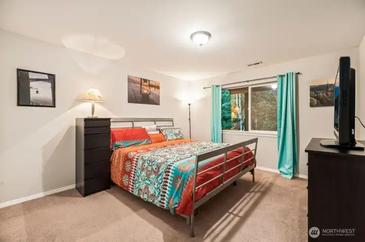 The lower level bedrooms are very large. Teen, roommate or multi-generational living sized!