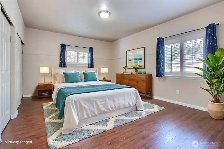 Primary suite is large, to accommodate a king sized bed suite.