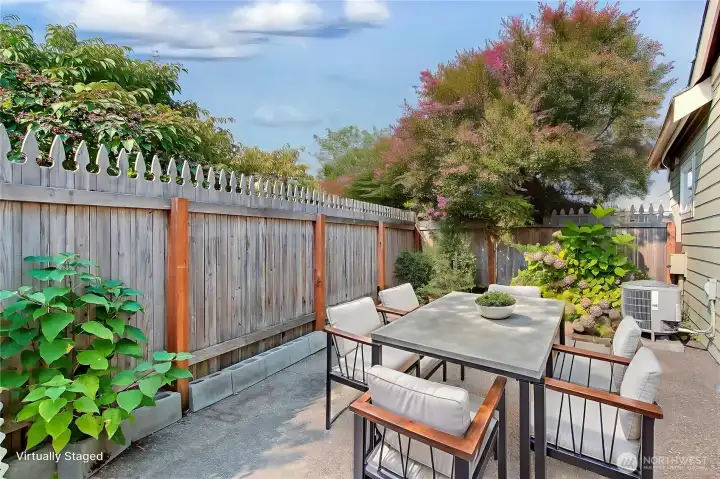 Private side patio for outdoor dining.