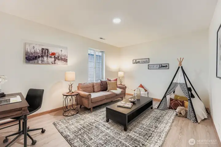 Open loft, versatile space for office, play, or extra living area