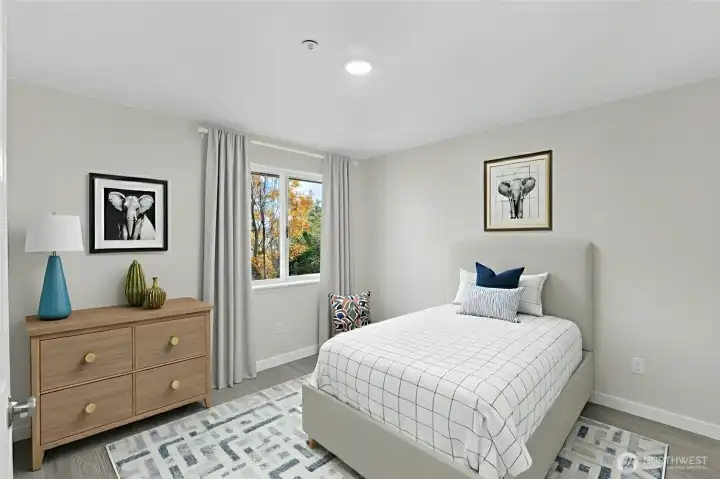 Third bedroom with fresh paint and versatile use—guest room, office, or flex space in Everett townhome. Virtually Staged