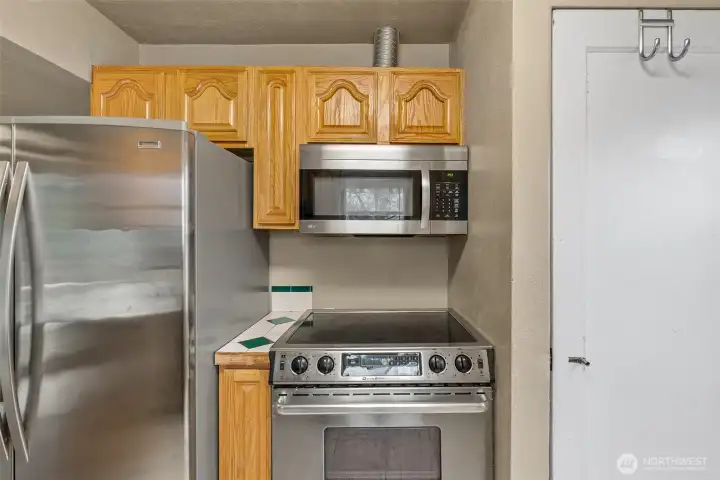 Conveniently located door to side yard and downstairs.