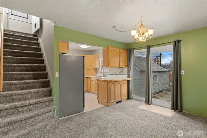 Stairs leading up to Master Bedroom with walk in closet.