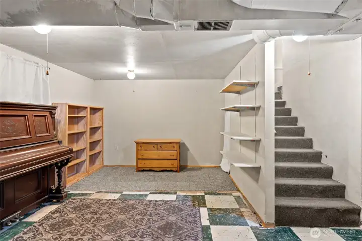 Large family room downstairs for multifamily living.