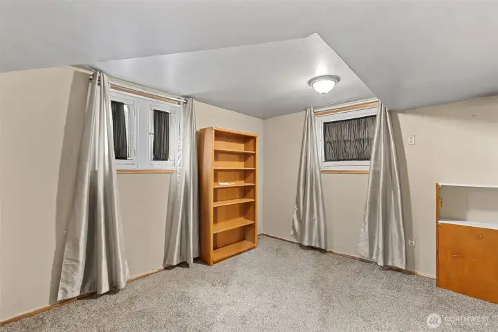 Large downstairs bedroom with egress windows.