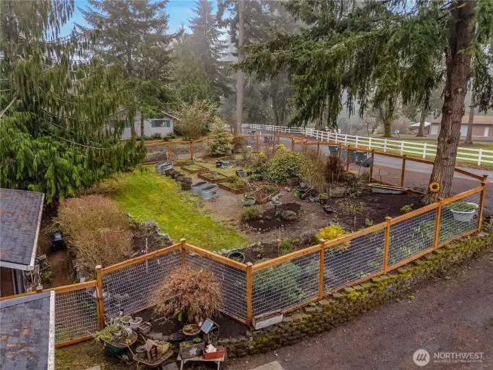 The six-foot fence keeps the wildlife from munching on your crops and ornamentals.