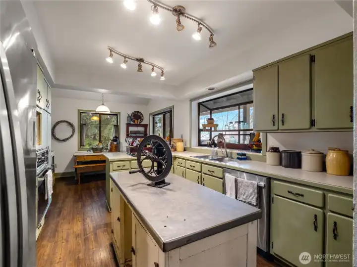 This farm kitchen is charming yet so functional. Please note that the kitchen island does not convey with the home.