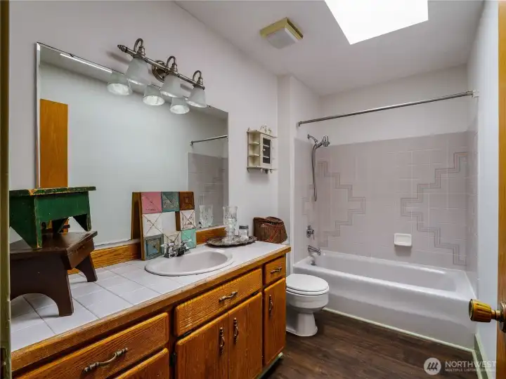 The full bathroom is conveniently located between the 1st and 2nd bedroom.