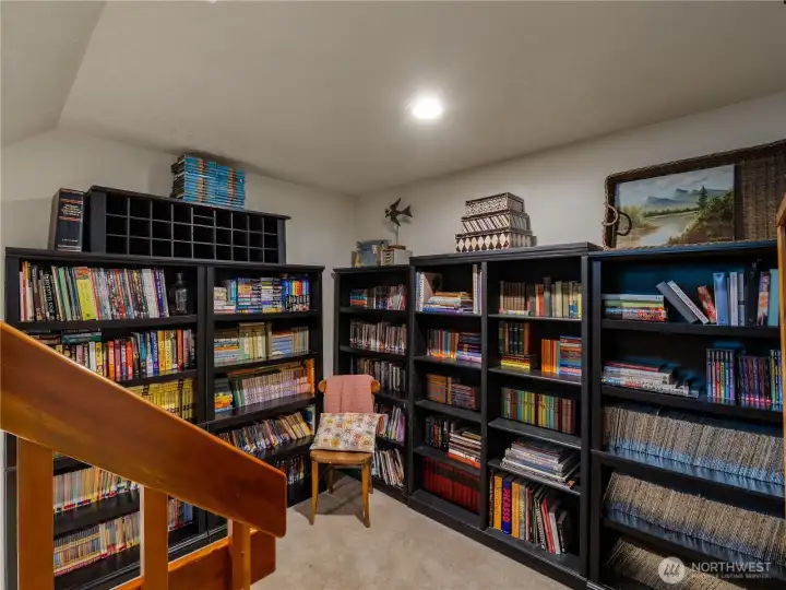 The landing, when descending to the lower level is perfect for a book nook or library corner.
