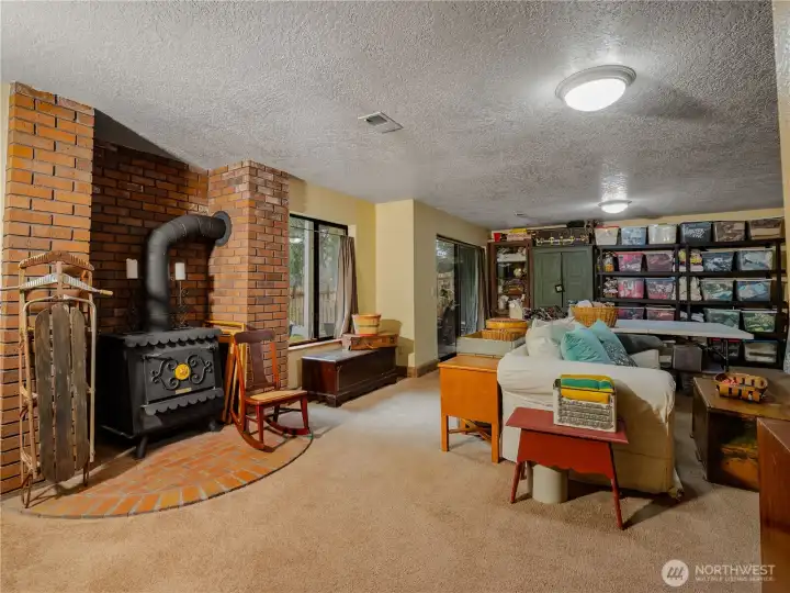 In the daylight basement you have a woodstove that may come in handy during cold winter days.