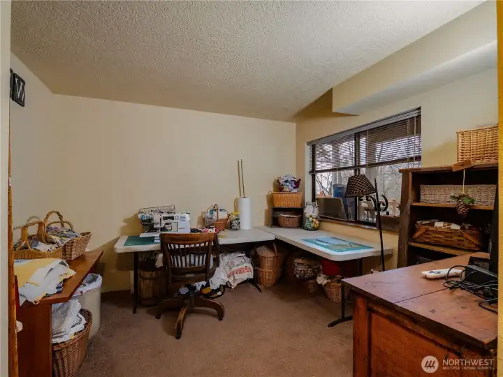 The daylight basement has a 3rd bedroom that is perfect for an office.