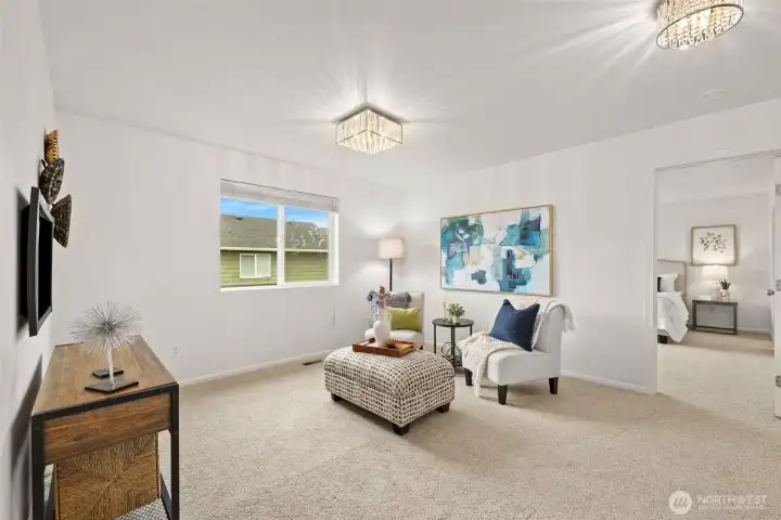 Upstairs loft/bonus room right off the primary suite