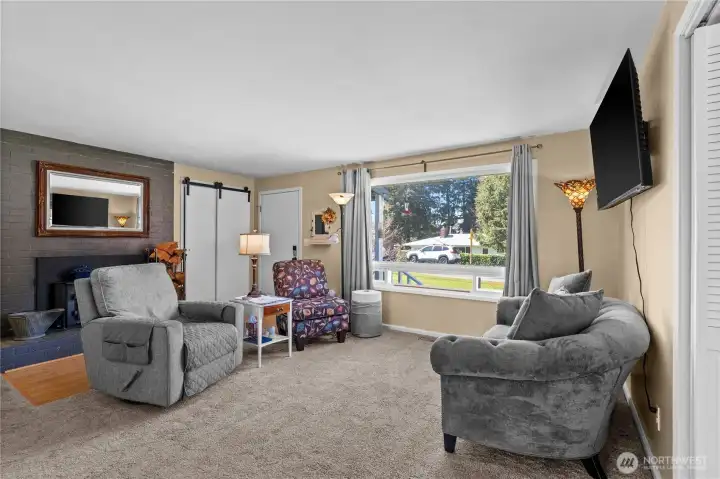 Hardwood floors lie beneath the current flooring—ready to be revealed and restored.