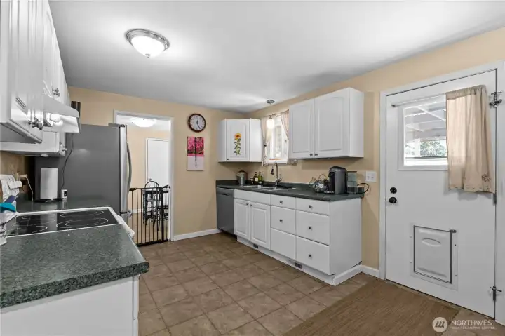 A pet door allows easy access to the fenced backyard for our 4-legged family members!