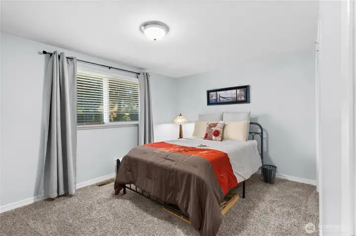 Bedroom #2 overlooks the back yard.