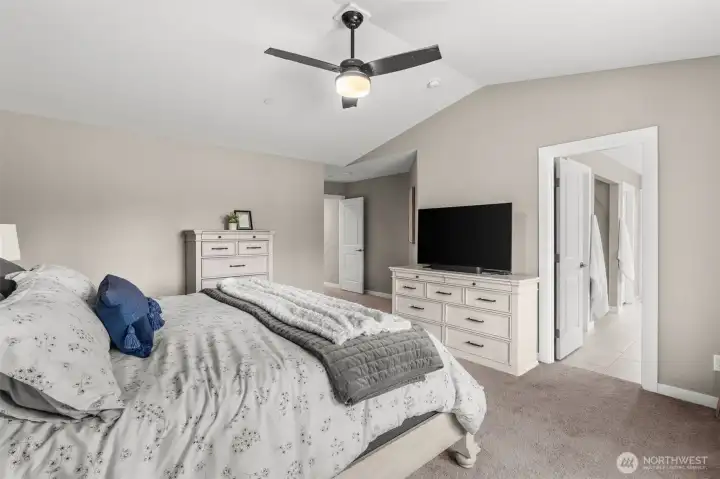 This elegant primary bedroom features is own spa-like en-suite bathroom!