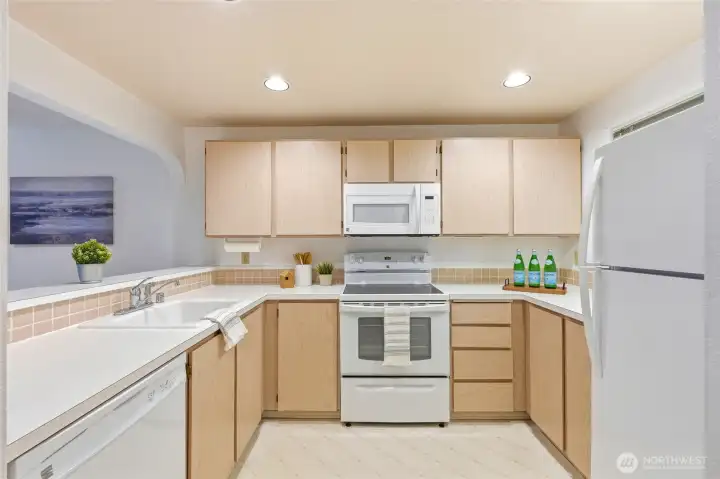 Spacious kitchen with generous counter space and natural light