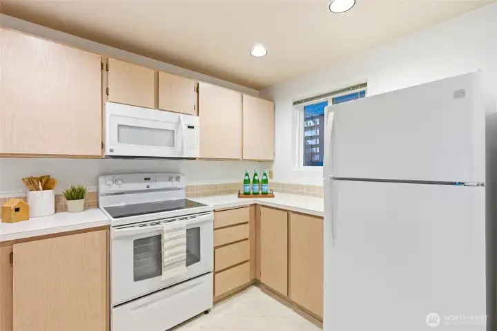 Kitchen featuring full appliance package and efficient layout