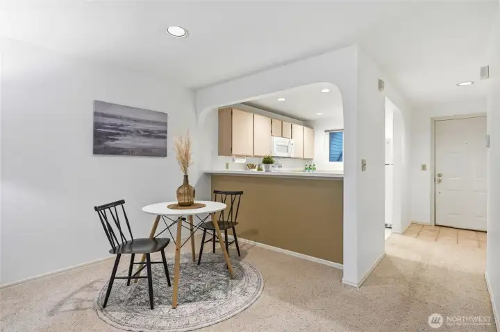 Open-concept layout connecting kitchen and dining area