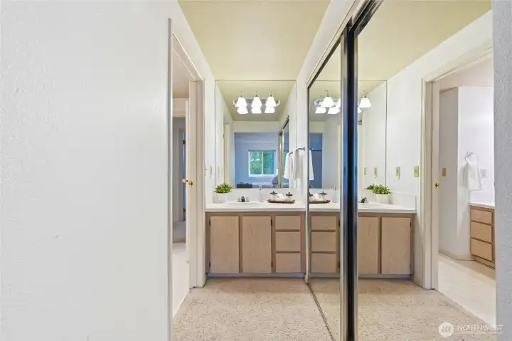 Vanity area with ample counter space and storage