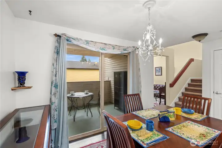 Dining area out to back deck on main