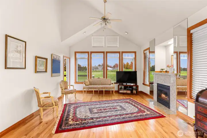 Living Room with vaulted ceilings looking out to mountain and territorial views
