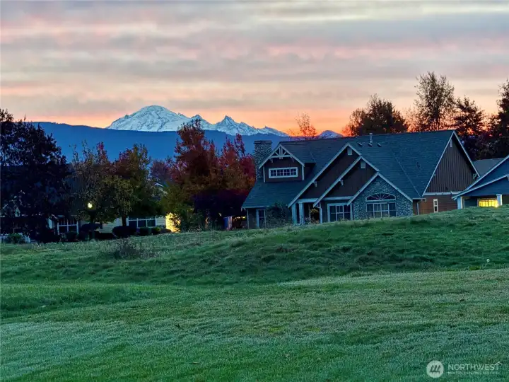 Sunrise coming up over Mount Baker and the Twin Sisters