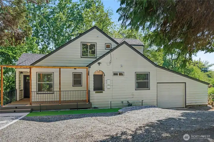 Welcome to this charming tudor home with old-world appeal and marvelous remodeling.