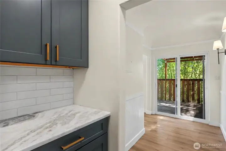 Hallway from laundry to living area.  Additional storage has been installed to coordinate with the kitchen.