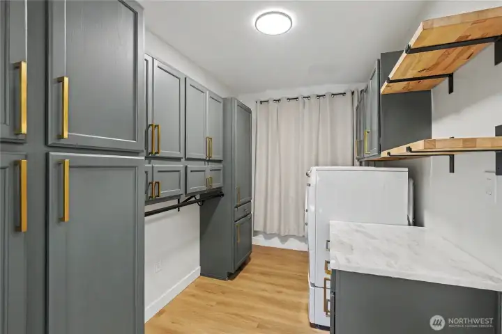 Open area for laundry, storage and multi-purpose uses.