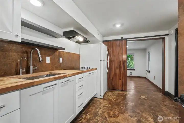 Kitchen in basement, possibly an apartment.
