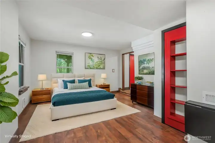 Staged bedroom on lower level.