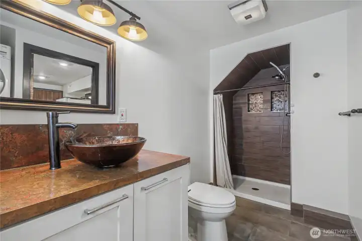 Another angle for viewing the downstairs three quarter bath.