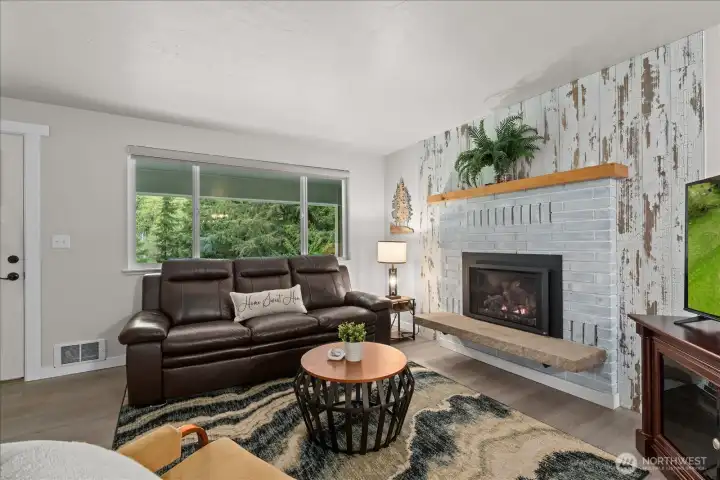 The open layout of the living room creates an ideal space for relaxing or gathering. The open layout of the living room creates an ideal space for relaxing or gathering.
