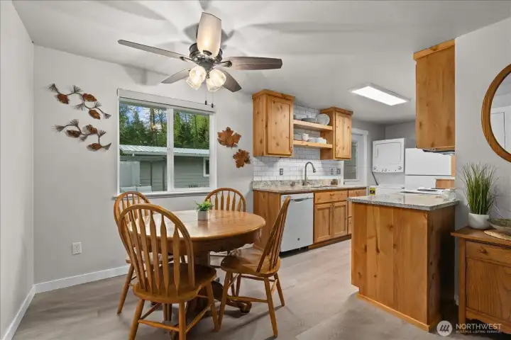Designed for both casual dining and entertaining, the dining room offers an open and inviting setting. Designed for both casual dining and entertaining, the dining room offers an open and inviting setting.