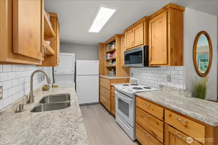 Soft-close cabinetry gives the kitchen both style and everyday functionality. Soft-close cabinetry gives the kitchen both style and everyday functionality.