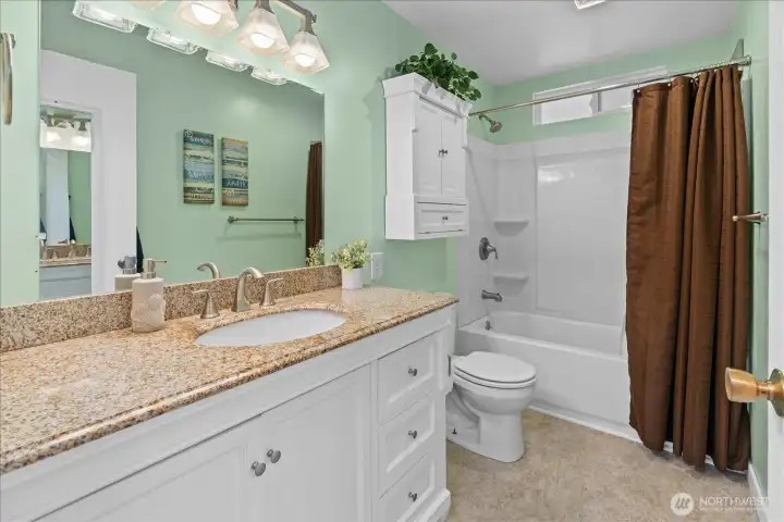 Clean and thoughtfully updated, the bathroom offers modern appeal. Clean and thoughtfully updated, the bathroom offers modern appeal.