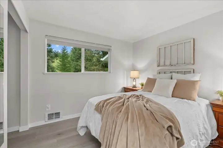 Bright and welcoming, Bedroom 2 offers flexible use for guests or a home office. Inf Bright and welcoming, Bedroom 2 offers flexible use for guests or a home office. Inf