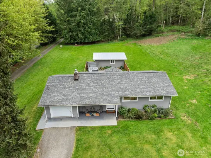 Spacious and usable, the backyard offers endless potential for outdoor enjoyment. Spacious and usable, the backyard offers endless potential for outdoor enjoyment.