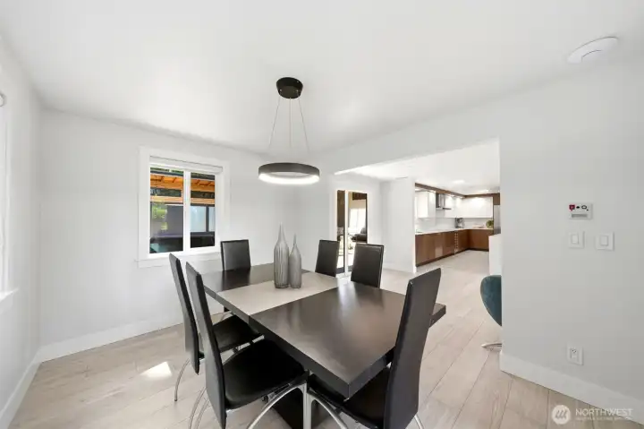 Dining area with seamless flow to indoor and outdoor living spaces.