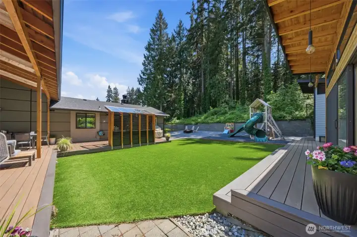 Enjoy summer nights on expansive covered deck designed for year-round enjoyment.