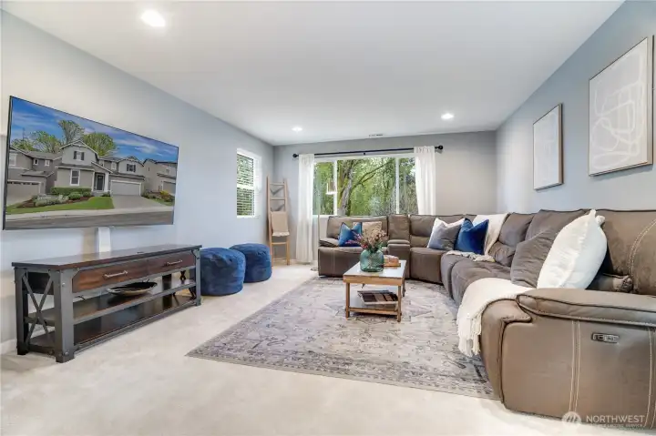 Bonus room is spacious, well lit and overlooks the green space and mature trees in the backyard. Bonus room is spacious, well lit and overlooks the green space and mature trees in the backyard.