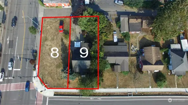 Lot #9 is red house. Lot #8 is available for sale.