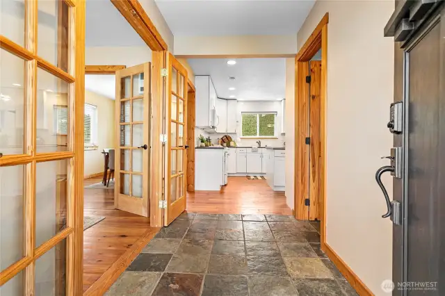 Welcome home! Rustic slate tile in entry, office to left; half bath on right